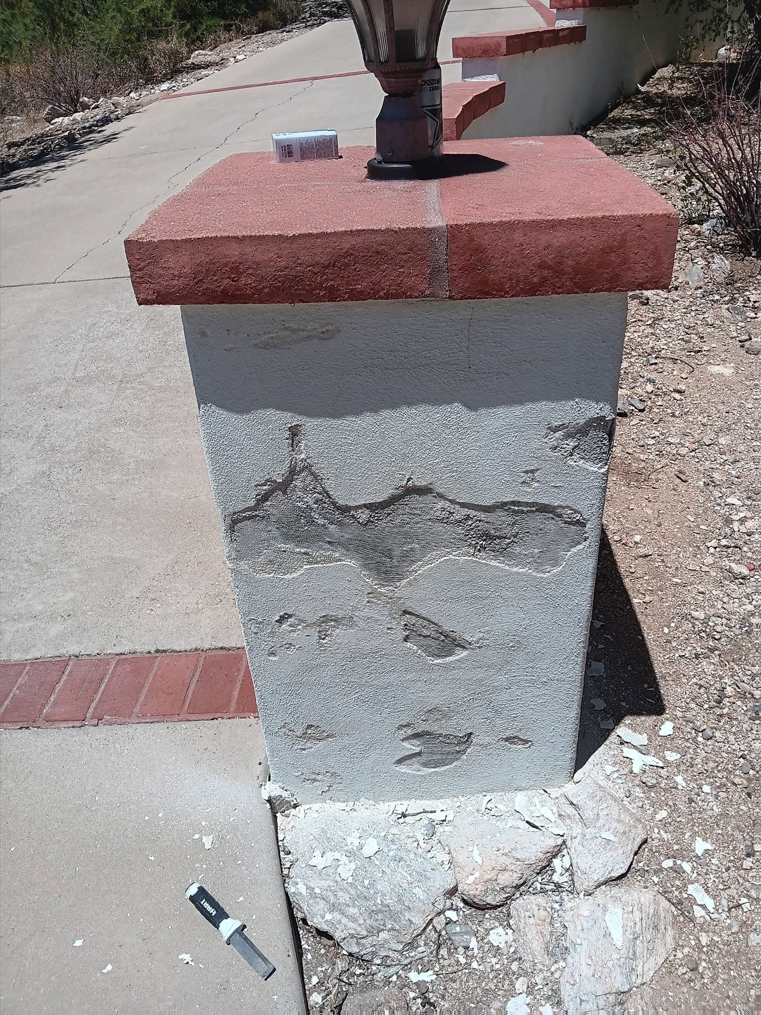 During: exposed entry pillar with patch material applied