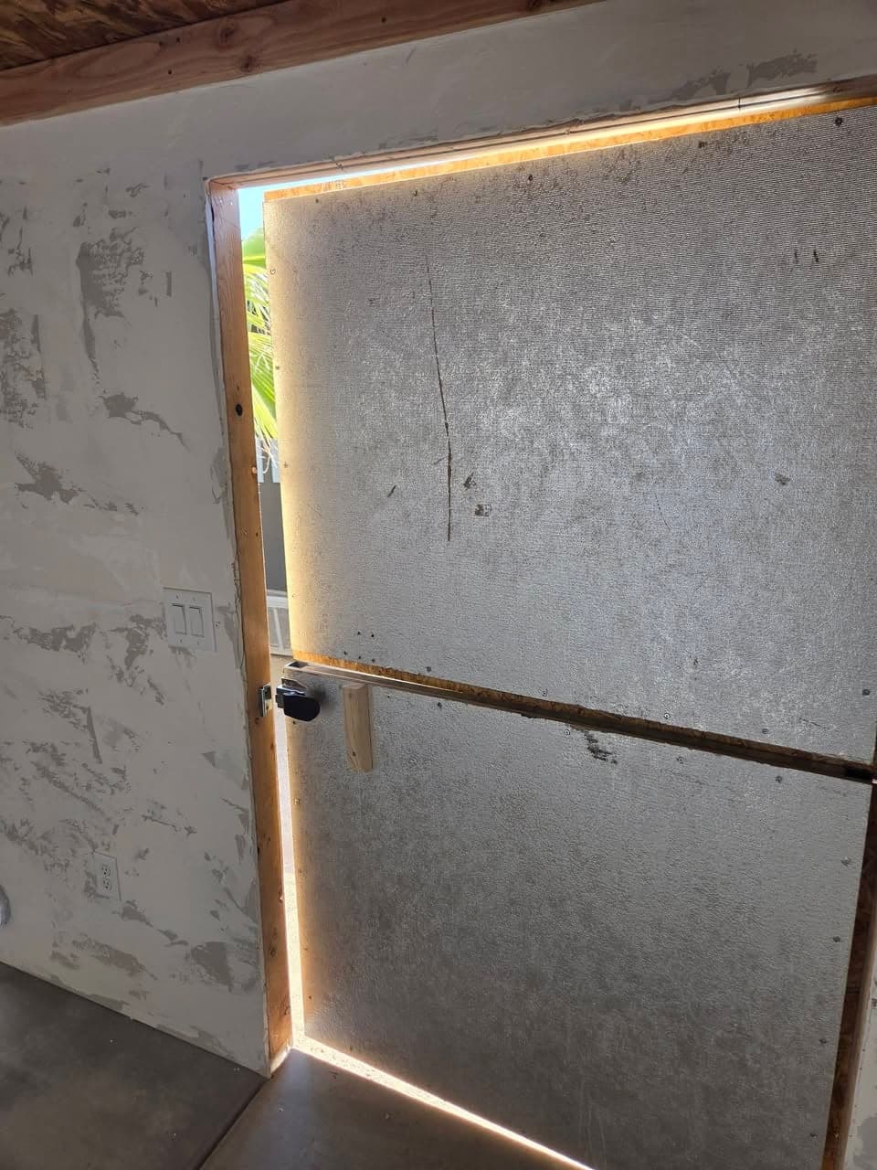 Unfinished interior face of the shed door