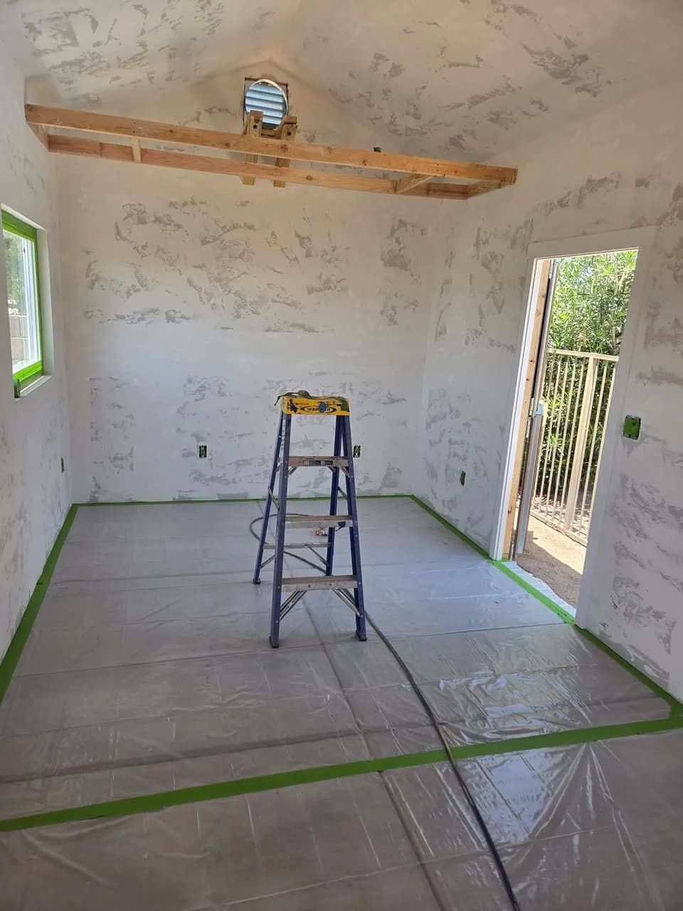 Before: unfinished shed interior prepared for its refresh